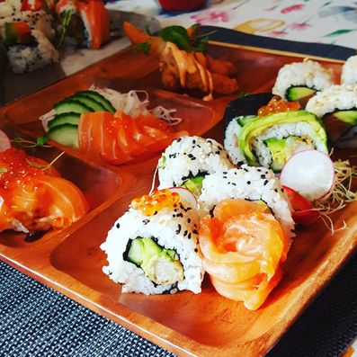 sushi with side dishes